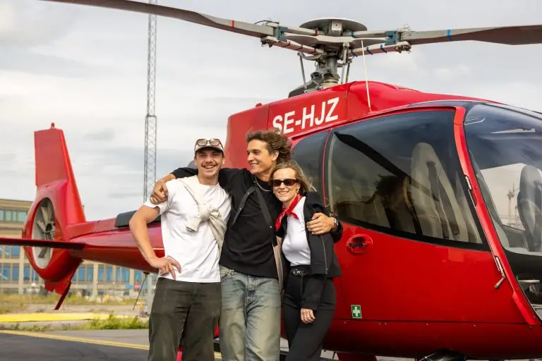 1 stockholm group in front of helicopter